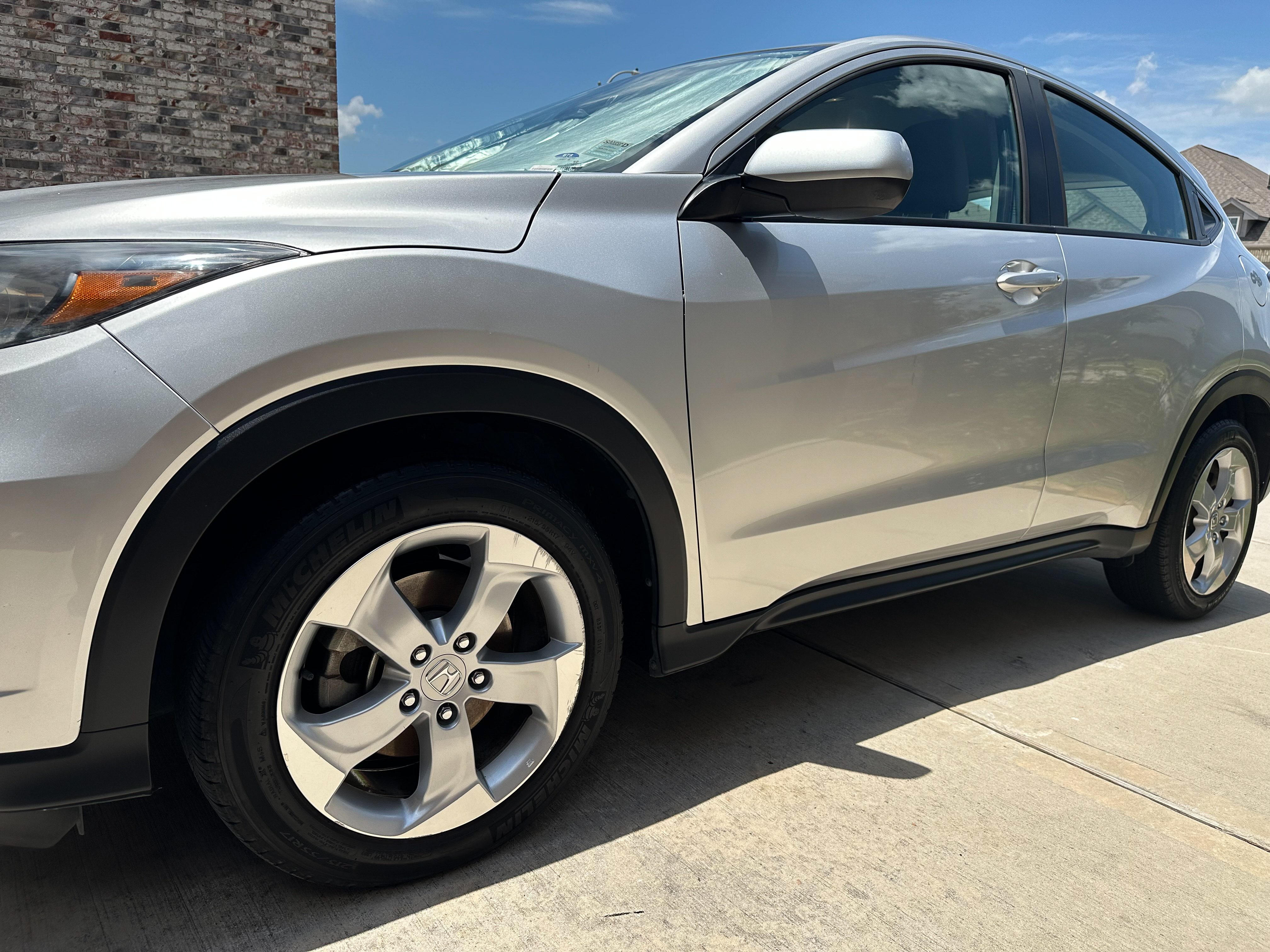 A silver Honda HR-V captured from the front WD banner-D.W Automotive Details